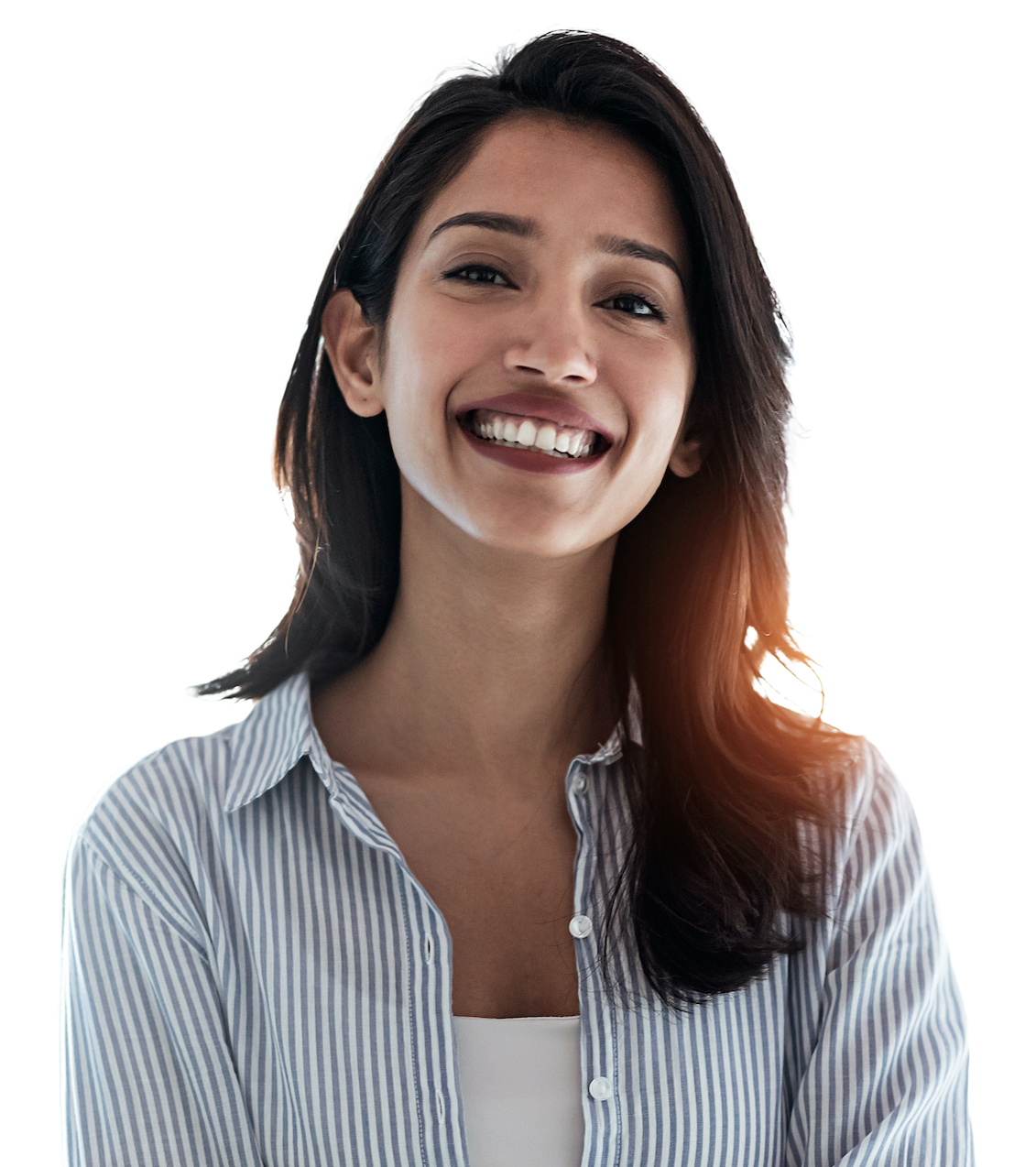 A smiling engineer with long dark hair in a blue-striped shirt