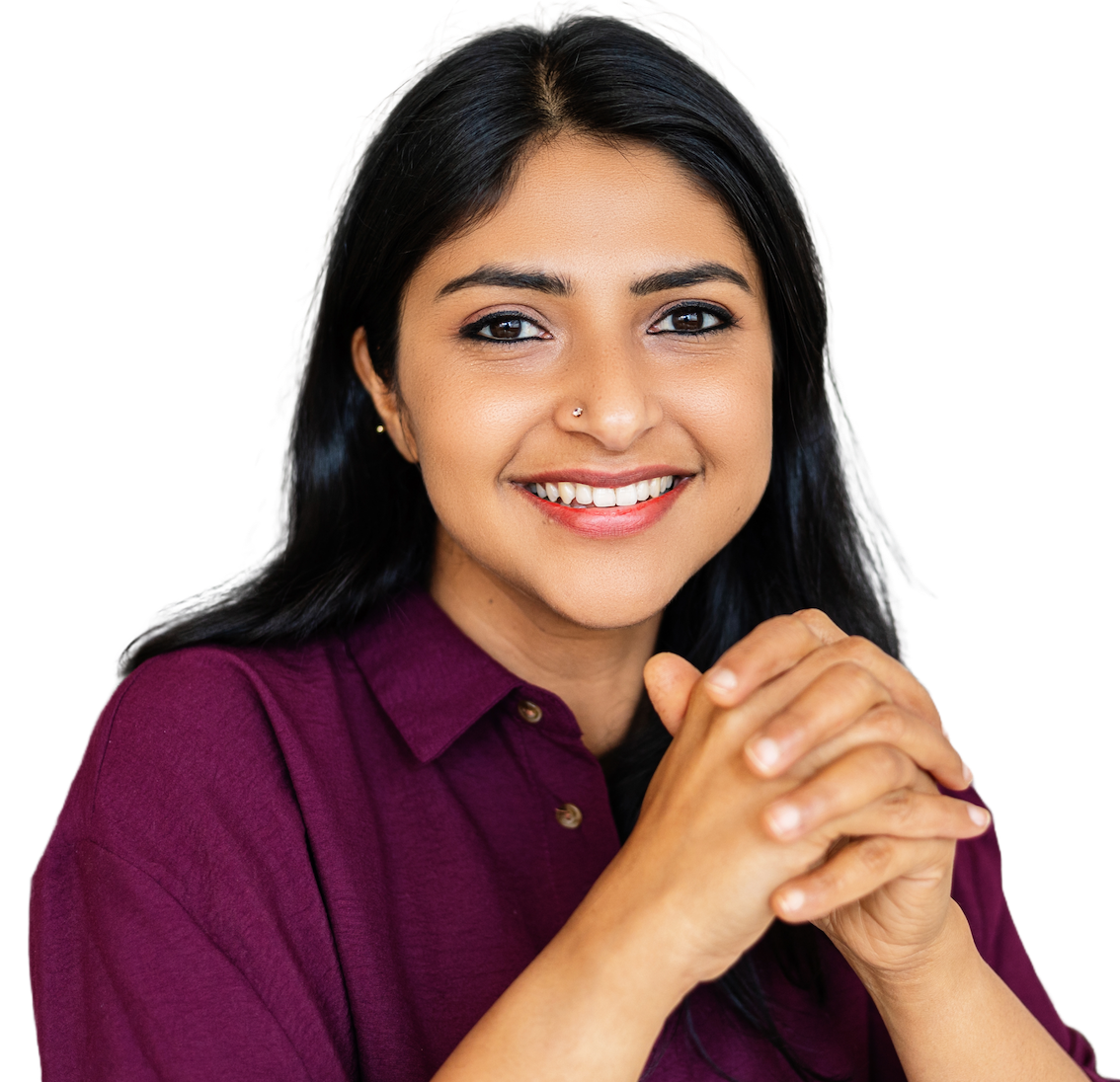 A smiling engineer with long dark hair in a burgundy shirt, hands clasped