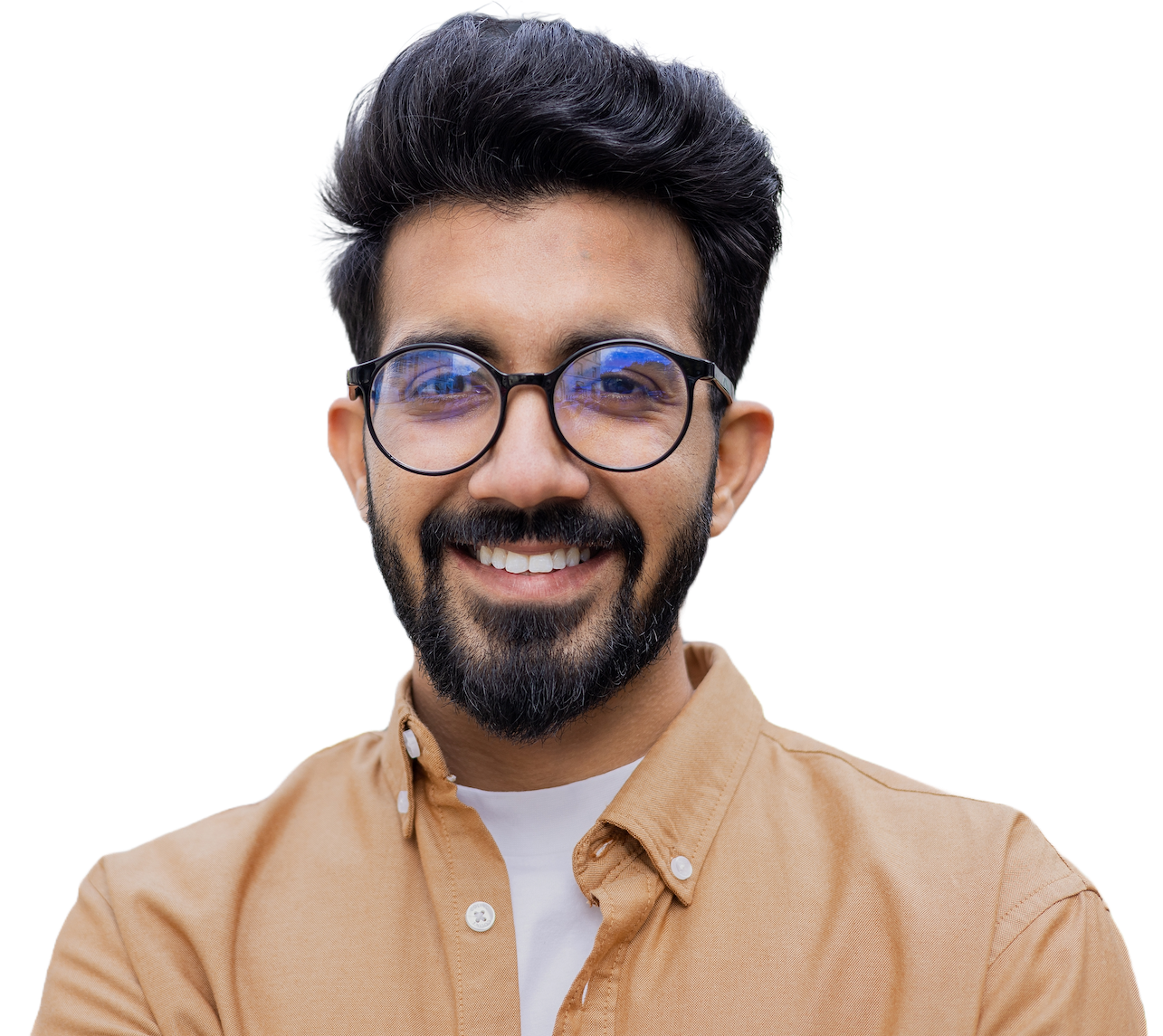 A smiling engineer with a dark beard and round glasses in a tan shirt over a white T-shirt