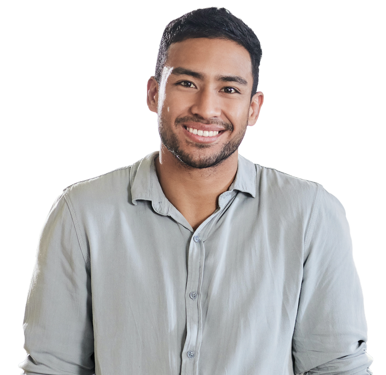 A smiling engineer with a short beard in a grey button-up shirt