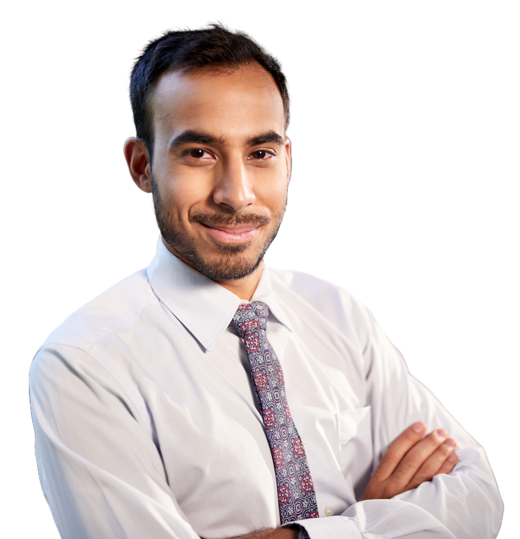 A smiling engineer in a shirt and tie with folded arms