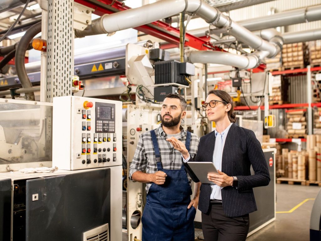 engineer-and-manager-inspecting-factory-machinery-2026-01-05-00-21-19-utc